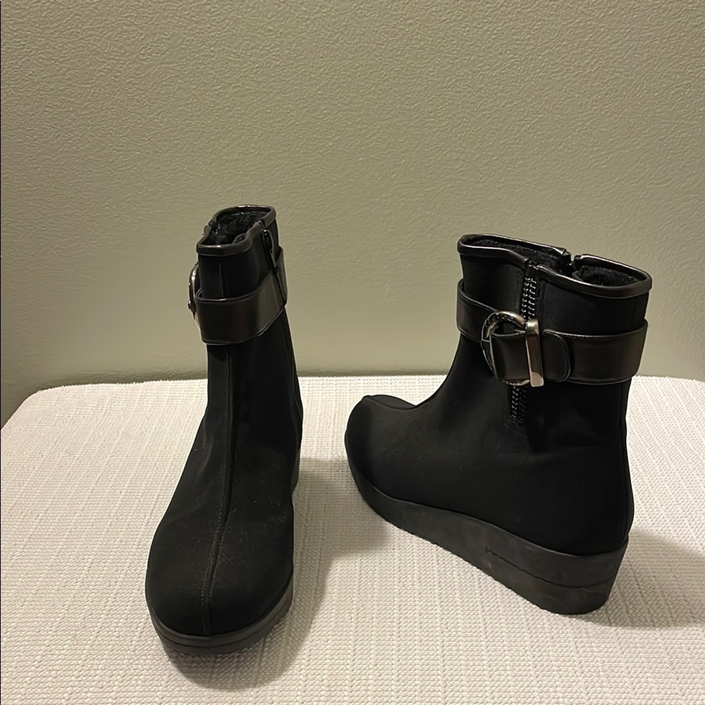 Stuart Weitzman, fur lined Black suede leather, wedge Booties.size 7M